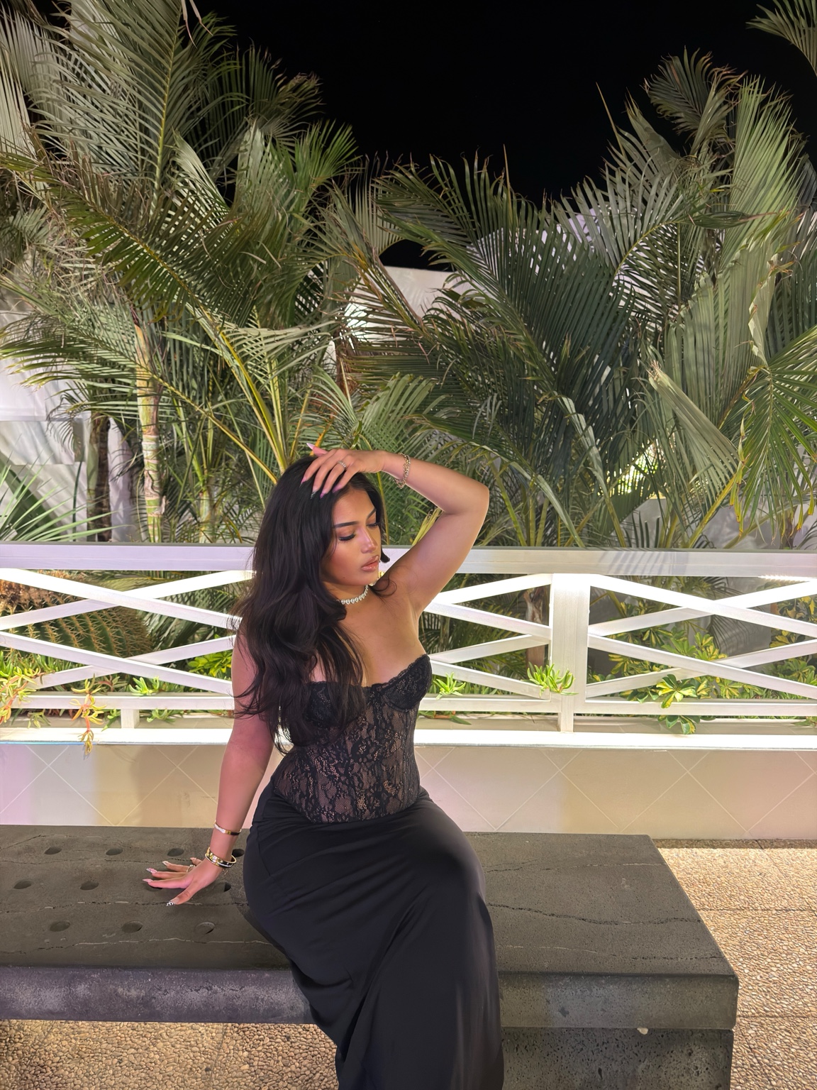 Mila by the palm trees